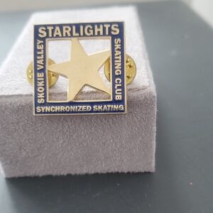 STARLIGHTS GOLD COLOR AND GOLD SKATING PIN. FOR A